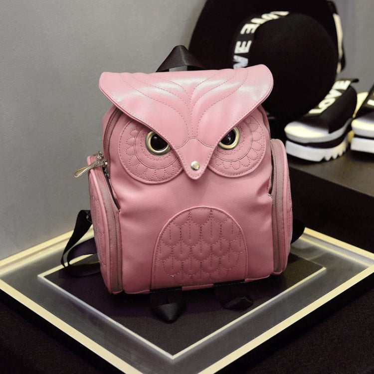 Pink owl-pattern mini backpack with stitched owl eyes and top flap