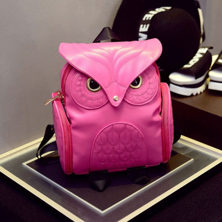 Pink owl-pattern mini backpack with owl eyes and curved top flap