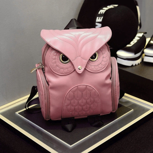 Pink owl-pattern mini backpack with embossed owl face and top flap