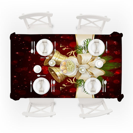 Rectangular Christmas tablecloth layout with dark red bells, pine, and candles on table.