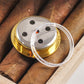 Gold hygrometer case with opened clear cover over sensor ports