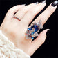 Blue gemstone butterfly statement ring set, with thin crystal band on hand