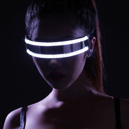 LED light-up glasses worn with bright white band across the eyes