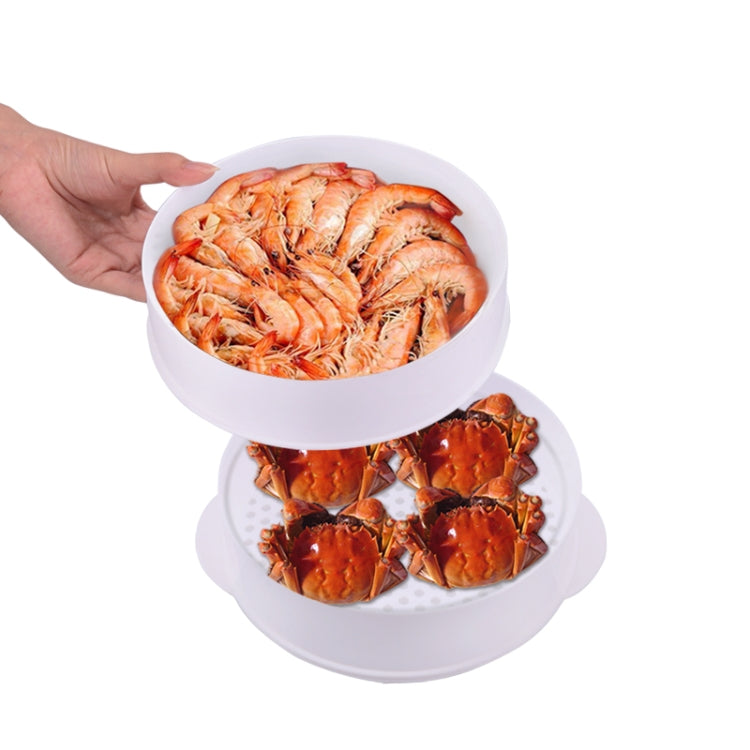 Double-layer microwave steamer cooker with prawns on top and bottom trays