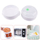 White double-layer microwave steamer cooker with perforated baskets, shown without food