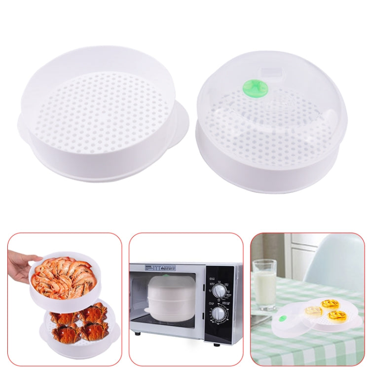 White double-layer microwave steamer cooker with perforated baskets, shown without food