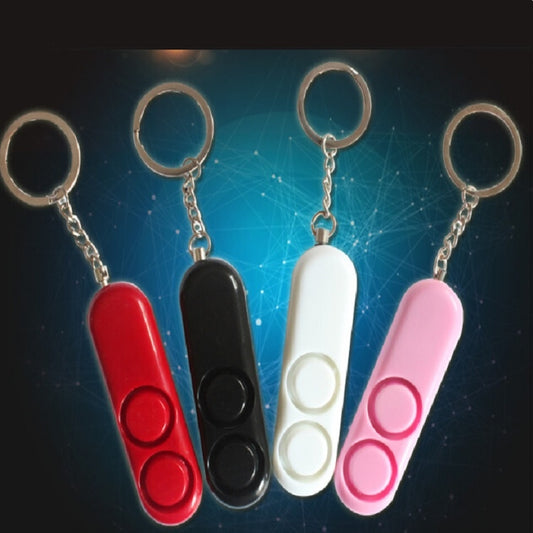 Safety personal alarm keychain, red and black dual-speaker body with metal key ring and chain.