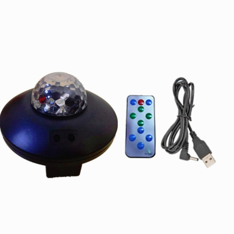 LED magic ball projector light with purple dome, remote control, and USB power cable