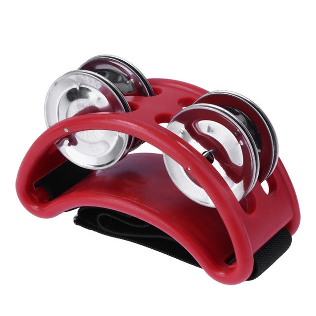 Red aluminum cajon foot bell with two chrome jingles and strap pad