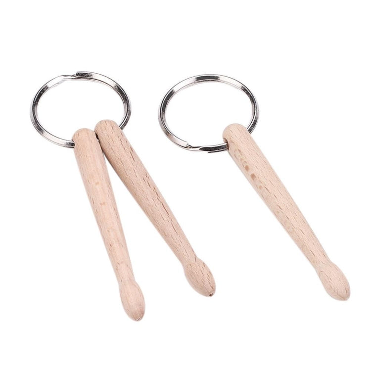 Pair of beech wood mini drumstick keychains with silver round rings