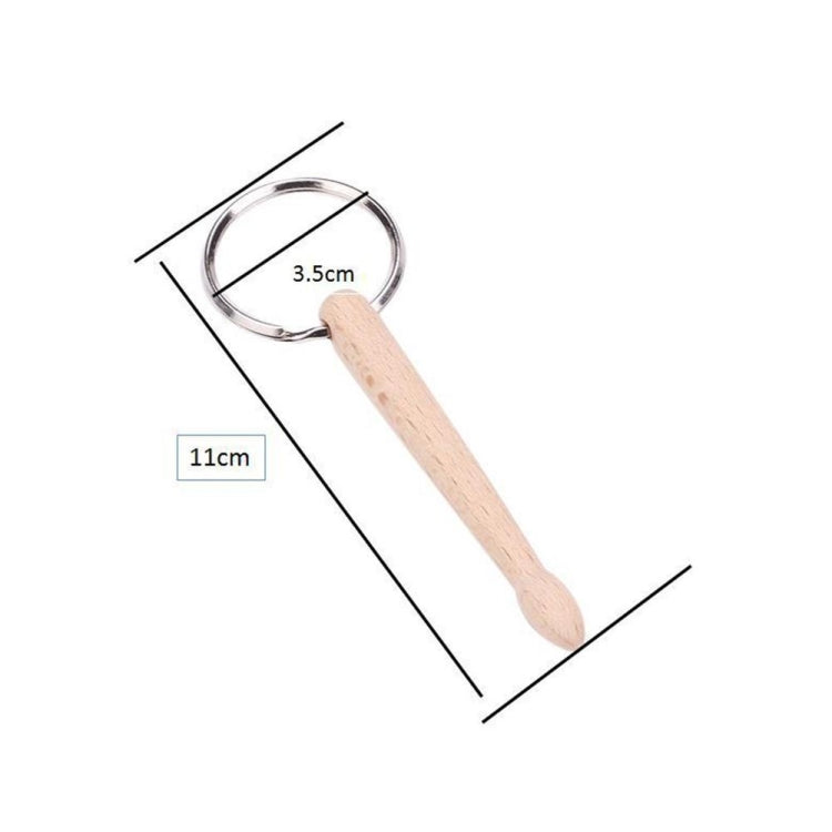 Beech wood drumstick keychain with silver ring, size markings: 11cm length