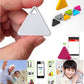 Triangular locator tag held in hand, with smartphone app displayed