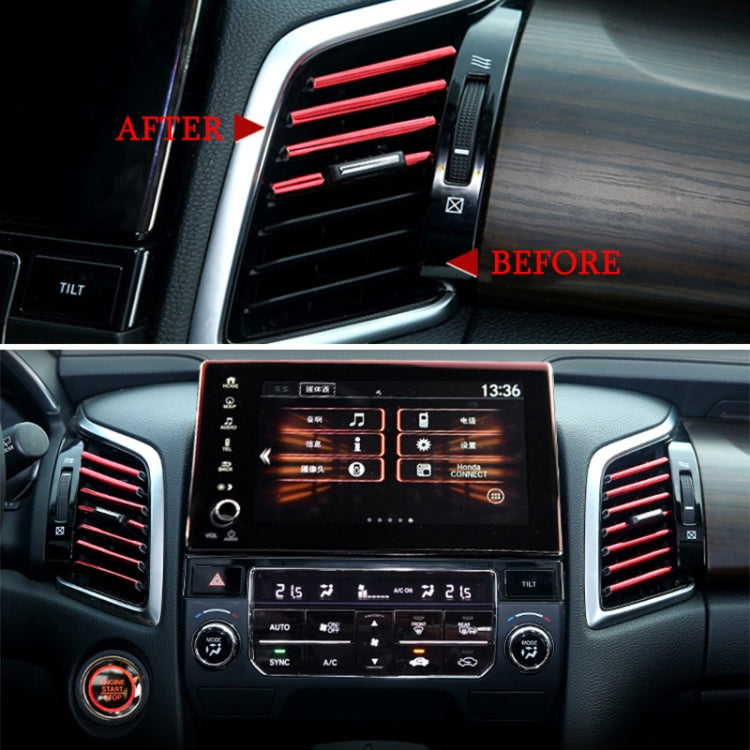 Car dashboard AC vents with red U-shaped trim strip clips installed