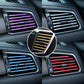 Assorted colors of U-shaped car AC vent trim strip clips on dashboard vents