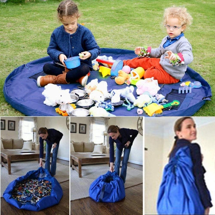 Blue round toy storage bag spread open on grass with toys for kids to sort
