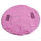 Pink round kids toy storage bag with drawstring closure and black carry straps