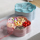 Pink flower-shaped snack storage box with transparent lid, open with compartment sections