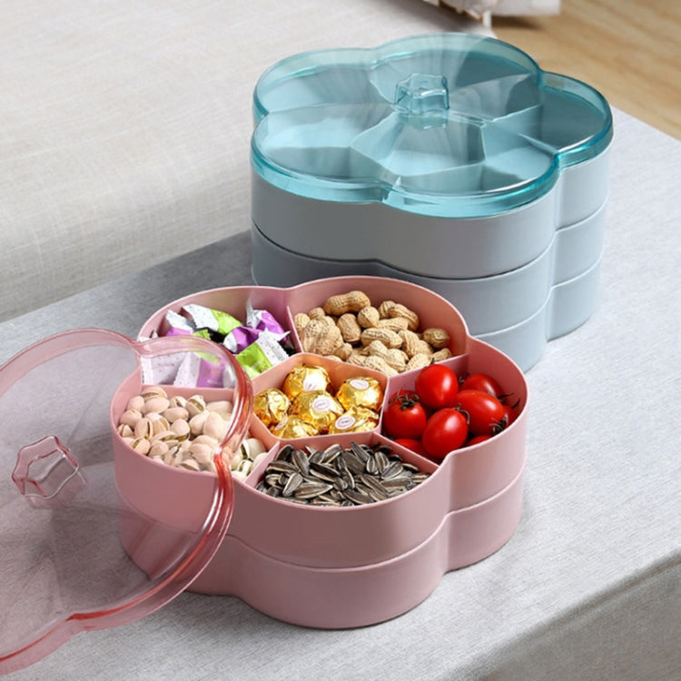 Pink flower-shaped snack storage box with transparent lid, open with compartment sections