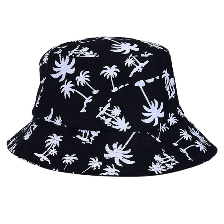 Black bucket hat with white palm and animal silhouettes, wide brim