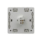 Back view of concealed wired doorbell switch with wiring terminals on white plate