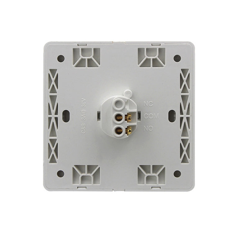Back view of concealed wired doorbell switch with wiring terminals on white plate