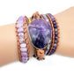 Purple amethyst pendant on multi-layer beaded wrap bracelet with leather ties
