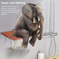 Wall-mounted shower chair with brown slat seat and silver frame arms