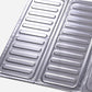 Close-up of louvered stainless steel cooktop oil shield panels