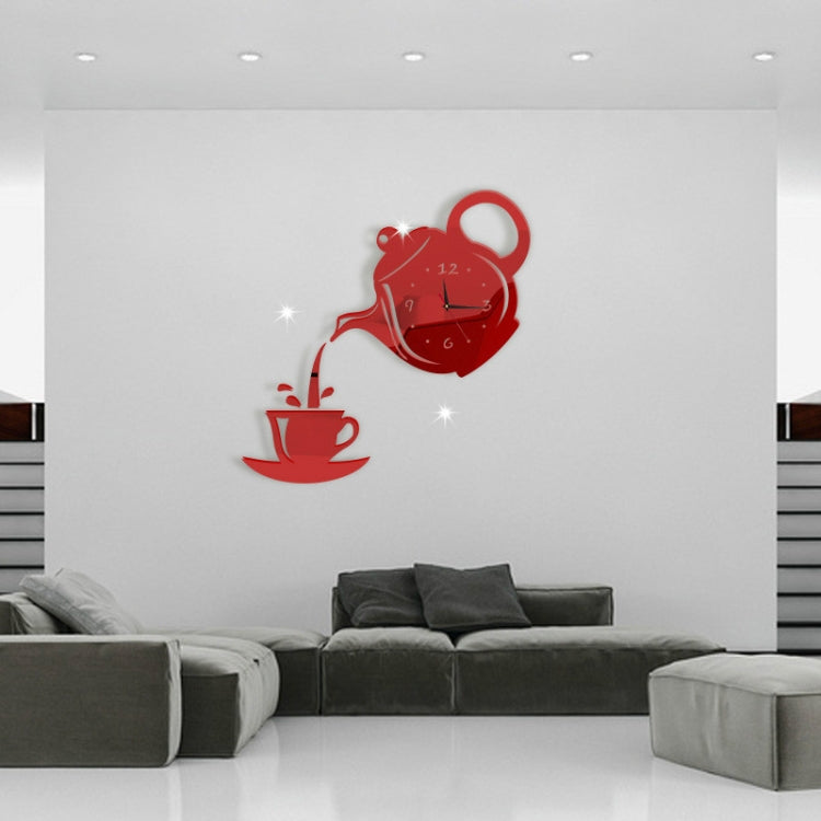 Red teapot-shaped acrylic wall clock with cup decal and red hands on a wall