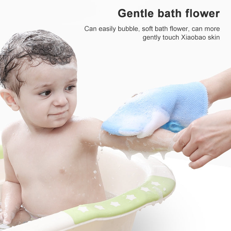Blue bear bath glove with ruffled scrubbing sponge, held during washing
