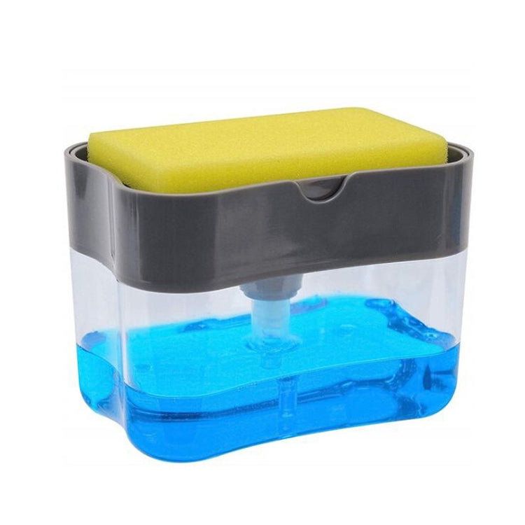 Gray soap dispenser with silver press cap and clear tank; blue liquid visible inside