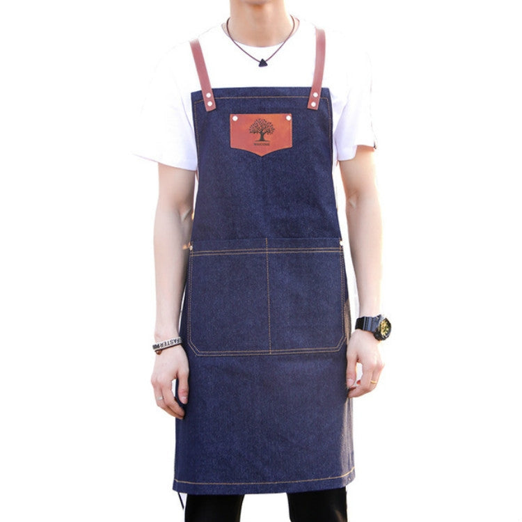 Blue denim hairdressing apron overalls with brown leather straps and front pocket