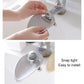 Gray toddler faucet extender snapping onto bathroom sink spout handle