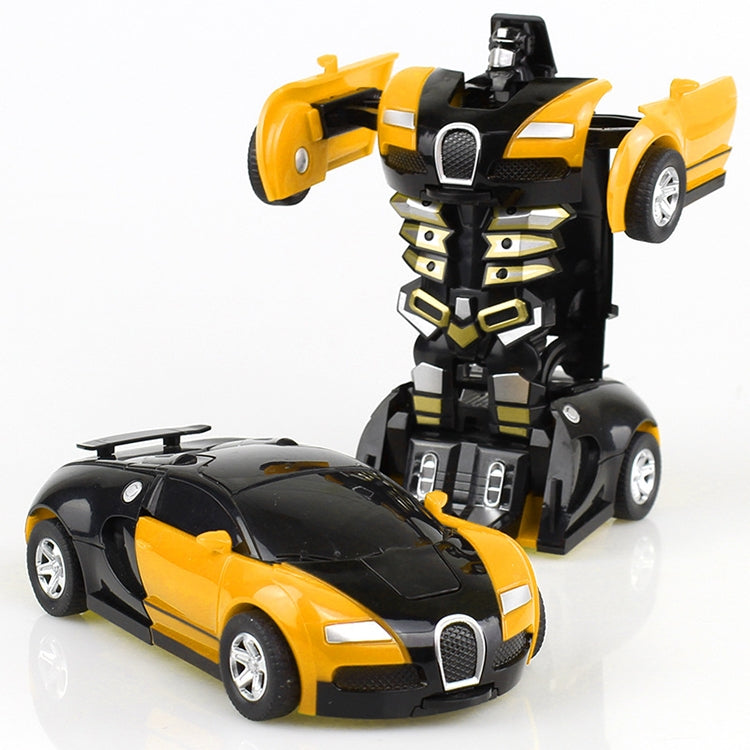 Yellow transforming toy car with black robot figure and compact sports car front