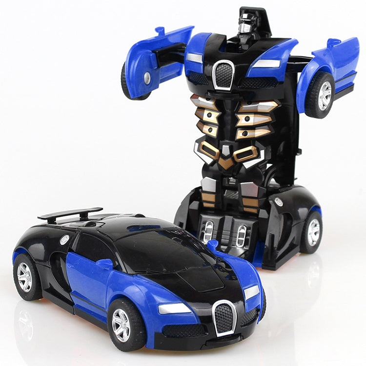 Blue transforming toy car with black robot and blue sports car, front-left angle