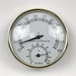 Round thermo-hygrometer gauge with temperature and humidity scales, gold metal frame