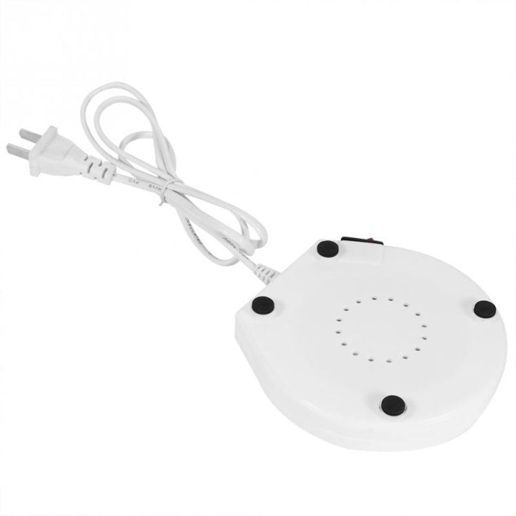 White electric beverage warmer pad with four feet and small vent holes
