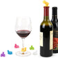 Cartoon silicone spiral wine stoppers set with clear bases and assorted red and green stoppers
