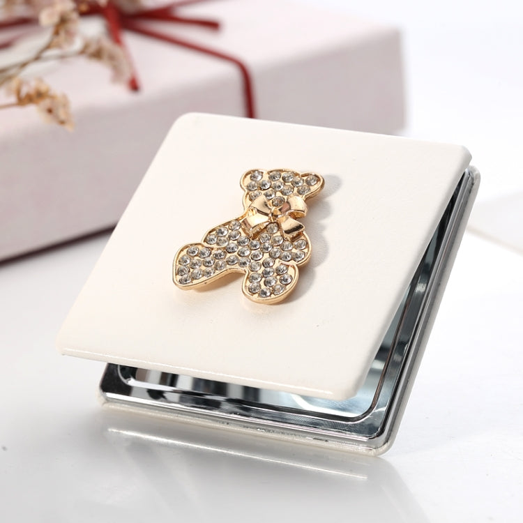 White PU leather folding mini makeup mirror with rhinestone teddy bear front, open glass