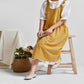 Ginger high-waist cotton-linen apron with bib front, gathered skirt, and front pocket