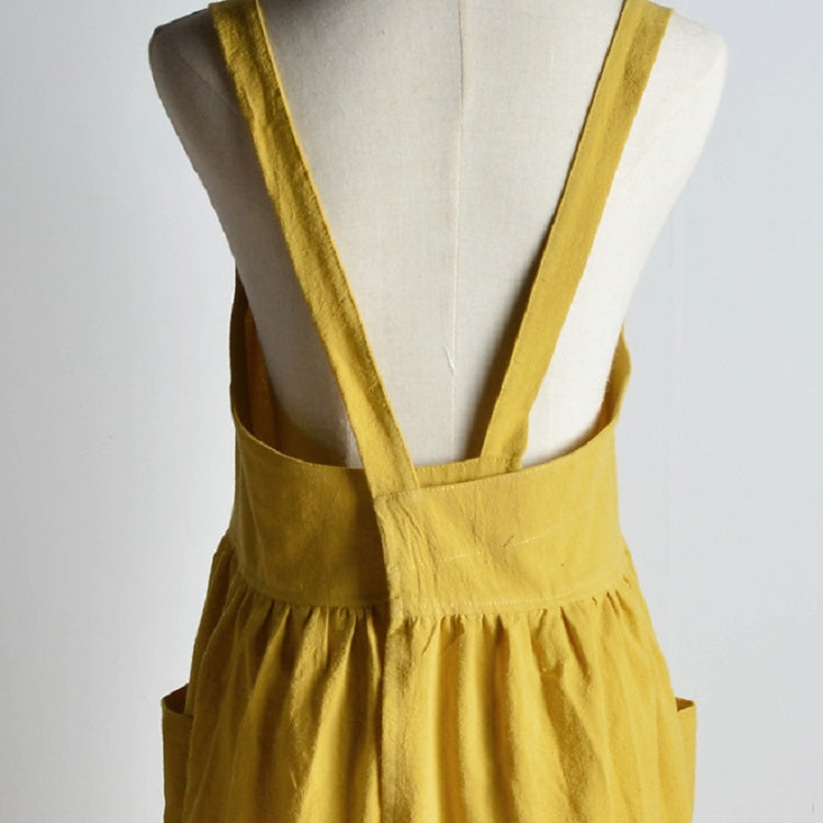 Ginger cotton-linen apron close-up: V-neck bib with adjustable shoulder straps