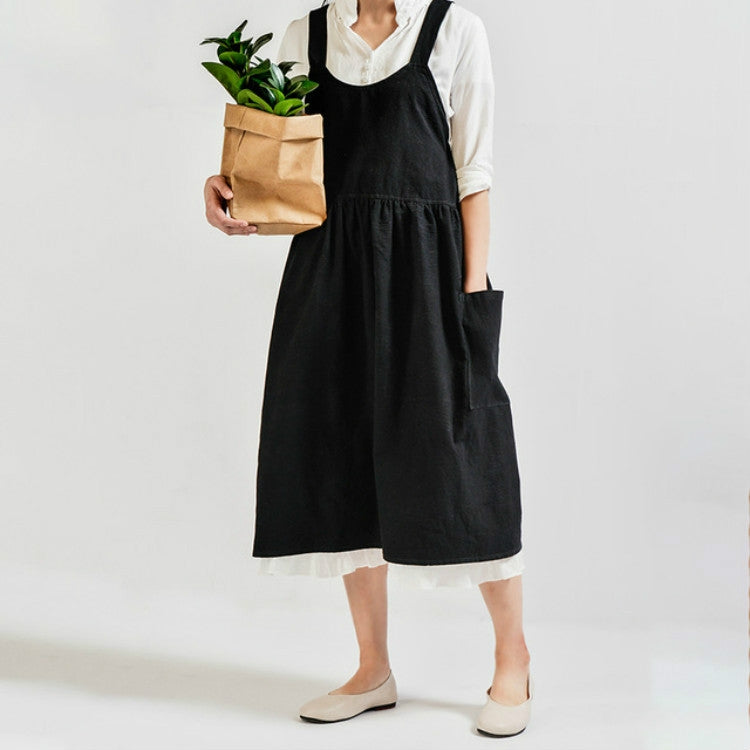 Black high-waist cotton-linen apron with bib front, gathered skirt, and side pockets