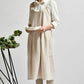 Almond high-waist cotton-linen apron with bib front, gathered waist, and side pockets