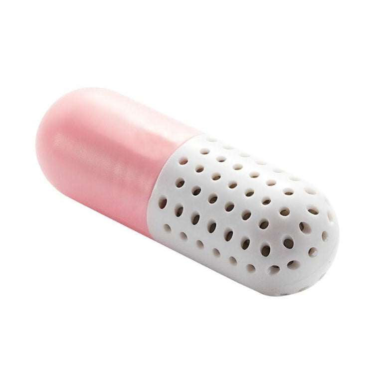 Pink and white capsule shoe deodorizer with perforated vent holes