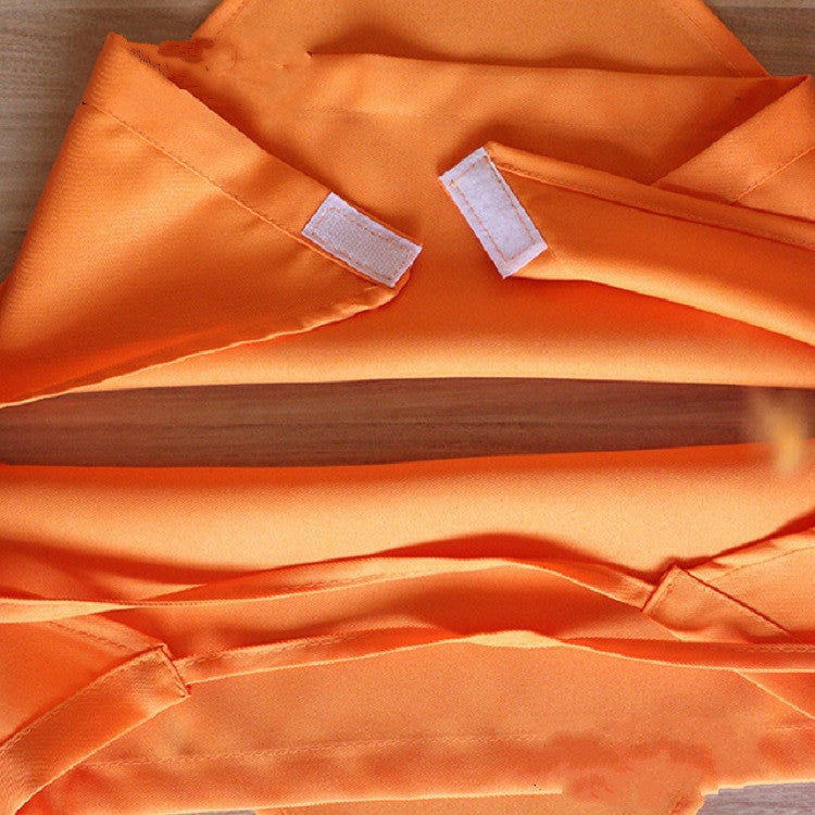Orange chef hat fabric with stitched seams and tag tabs