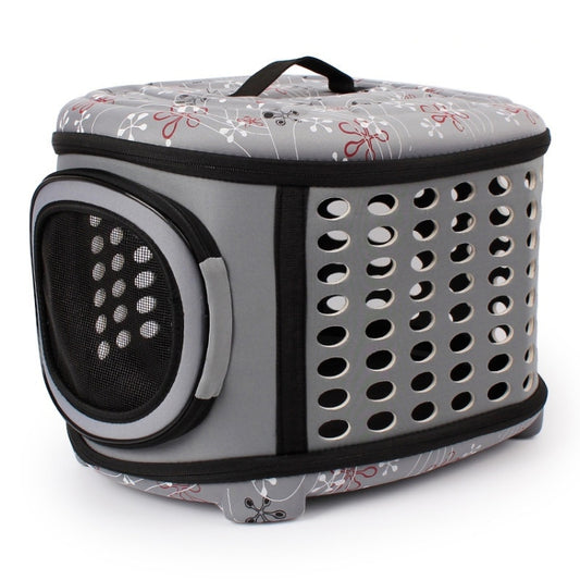 Gray folding pet carrier bag with mesh side window and vented metal panel, top handle.
