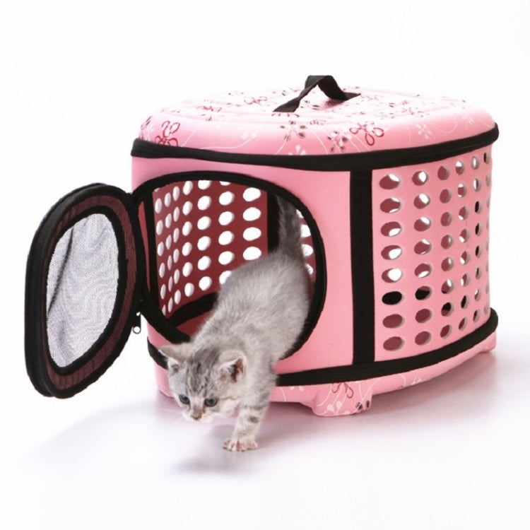 Pink pet carrier with vented metal side panel, mesh window, and pet inside; top handle.