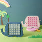 Dinosaur and elephant ice pop molds in blue and pink with square ice cavities
