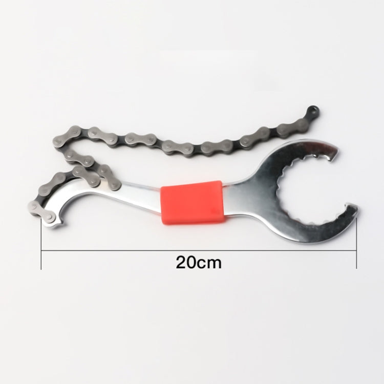Bicycle chain flywheel fixed wrench tool with orange-red grip and silver hooked head