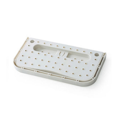 Wall hanging slipper storage rack with perforated tray and suction mount, white, folding design